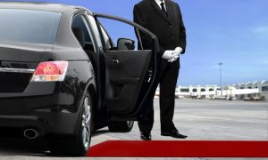 EMT chauffeur waiting at private airport terminal Dallas Fort Worth